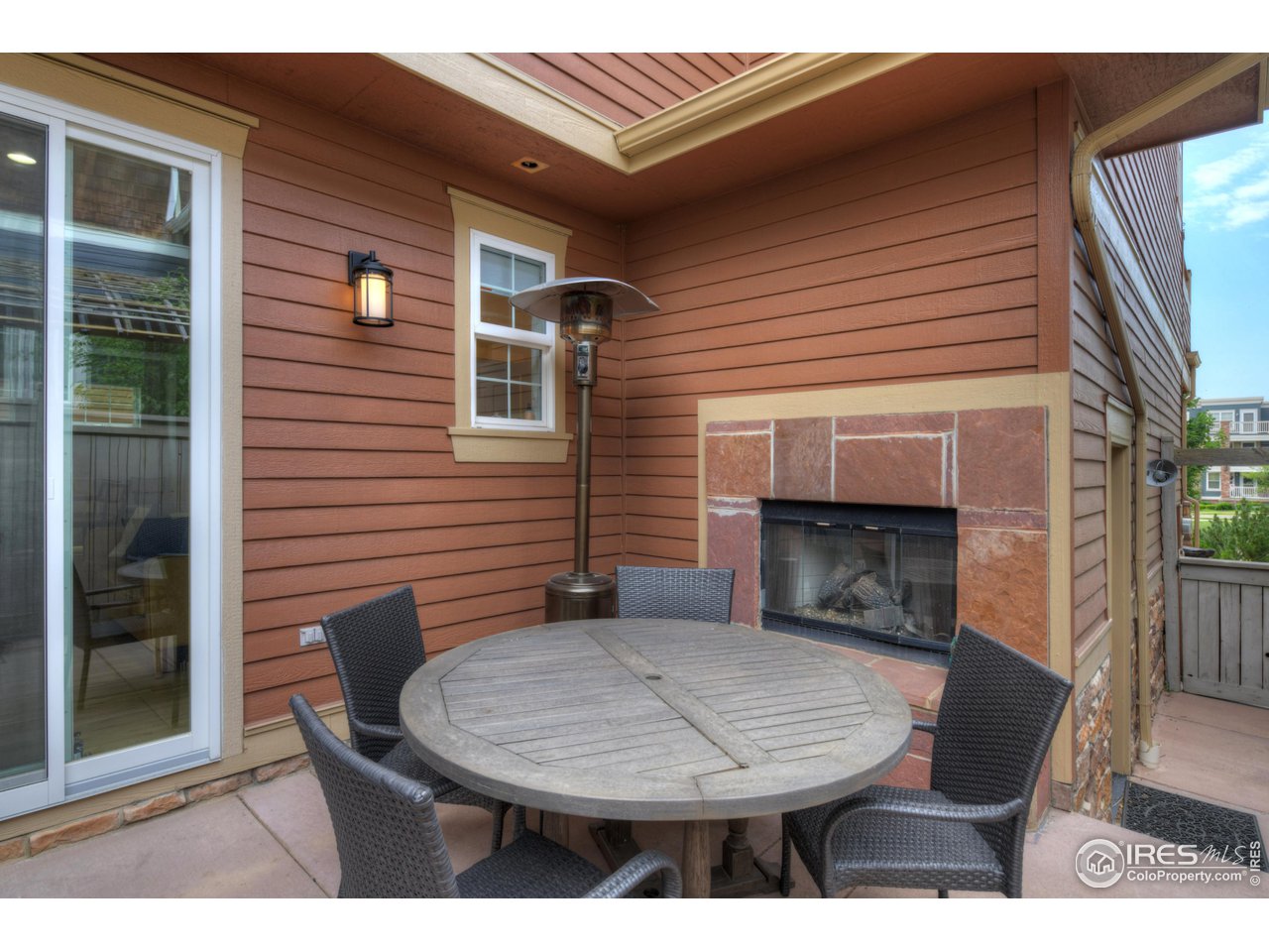 755 Terrace Circle South Boulder, CO 80304 - Photo 35 of 38 a backyard of a house with a table and chairs