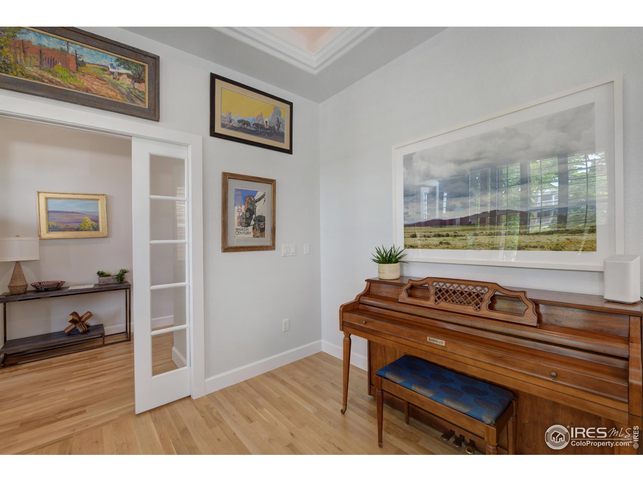755 Terrace Circle South Boulder, CO 80304 - Photo 6 of 38 a living room with furniture and a wooden floor