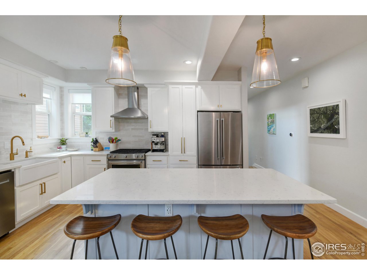 755 Terrace Circle South Boulder, CO 80304 - Photo 9 of 38 a large kitchen with cabinets table and chairs
