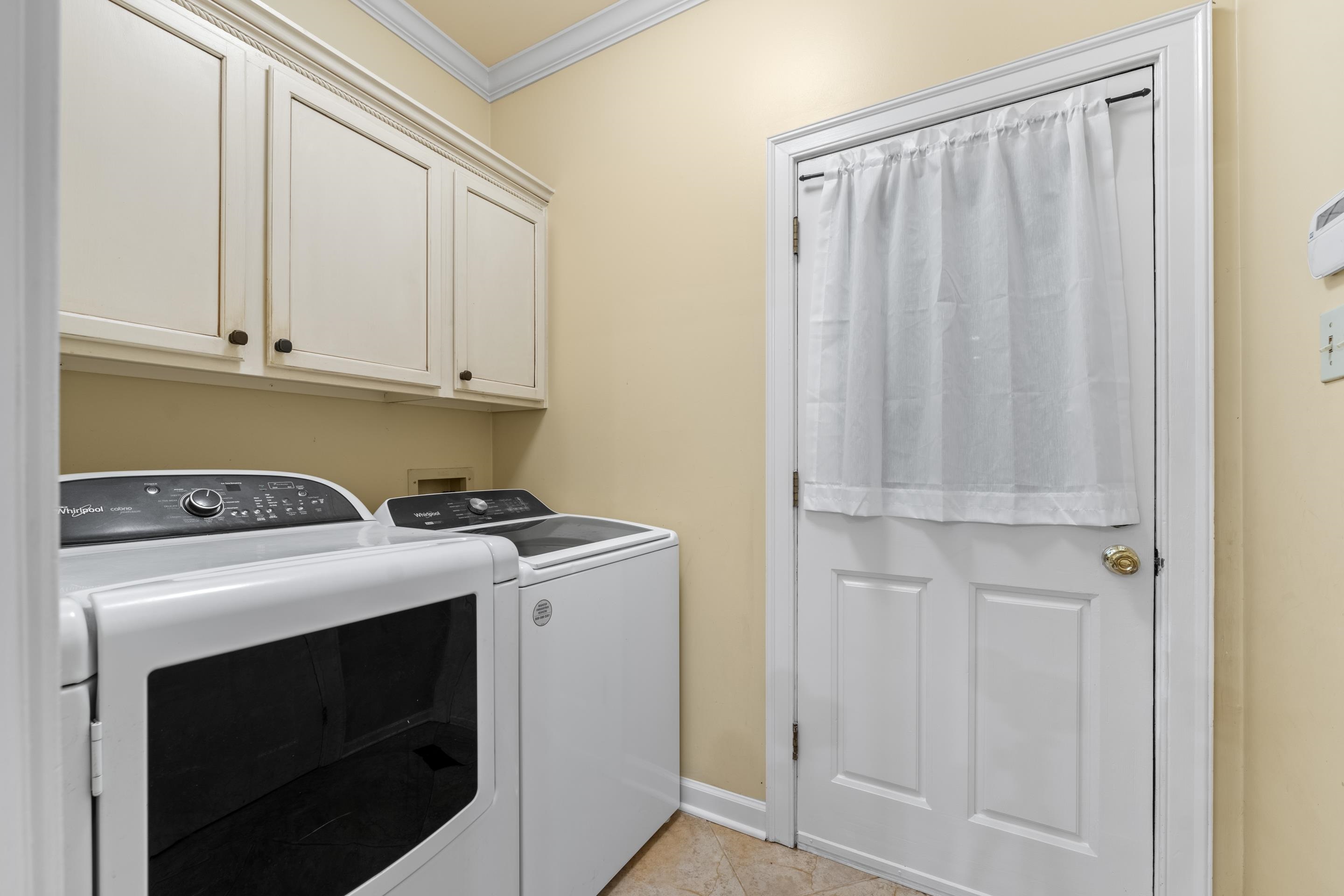 3430 Shea Road Collierville, TN 38017 - Photo 15 of 40 a utility room with dryer and washer