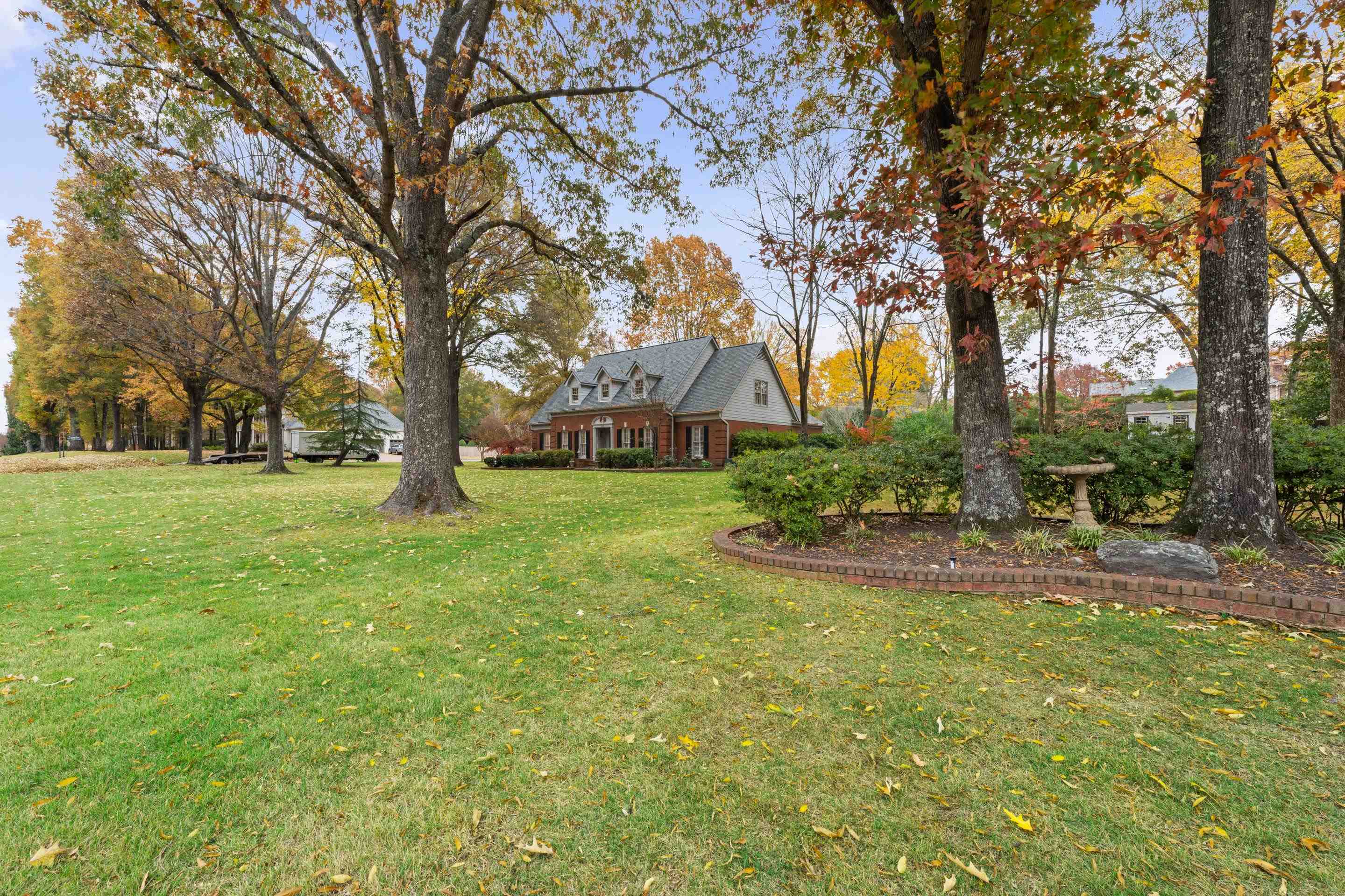 3430 Shea Road Collierville, TN 38017 - Photo 2 of 40 a view of a yard with tree s
