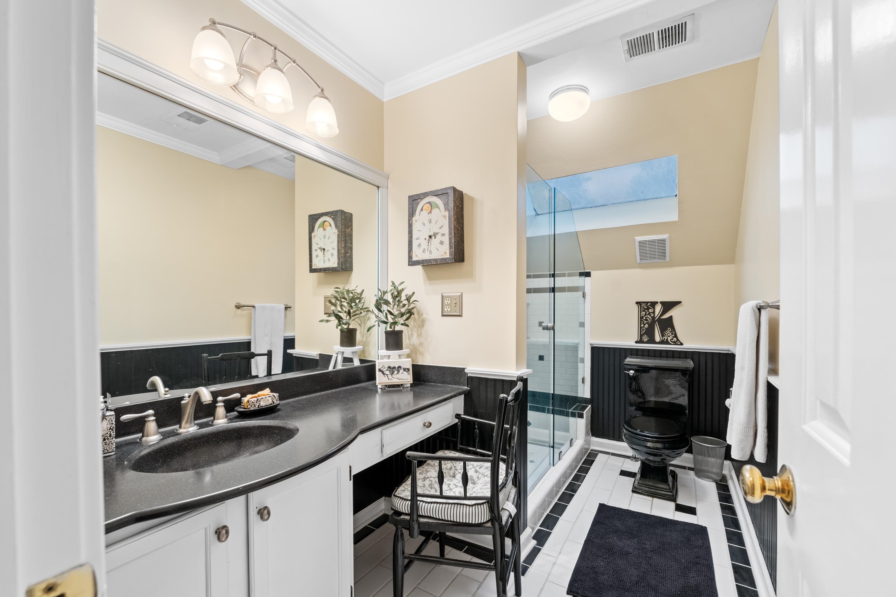 3430 Shea Road Collierville, TN 38017 - Photo 24 of 40 a en suite bathroom with a sink double vanity and a mirror