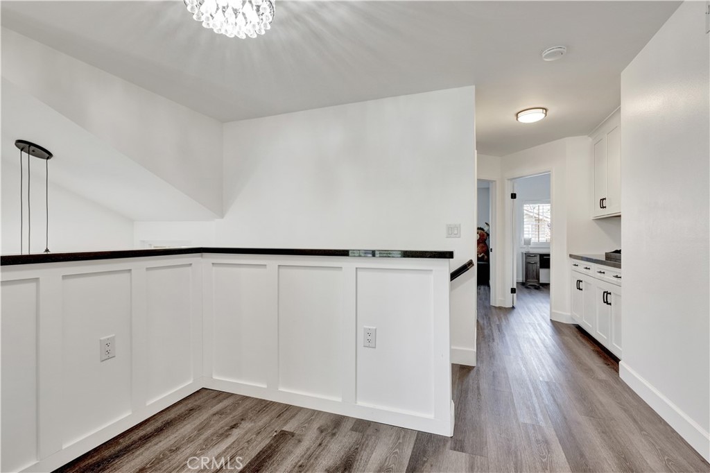 28102 Bobwhite Circle, Unit 3 Saugus, CA 91350 - Photo 27 of 50 wooden floor in an empty room with a window