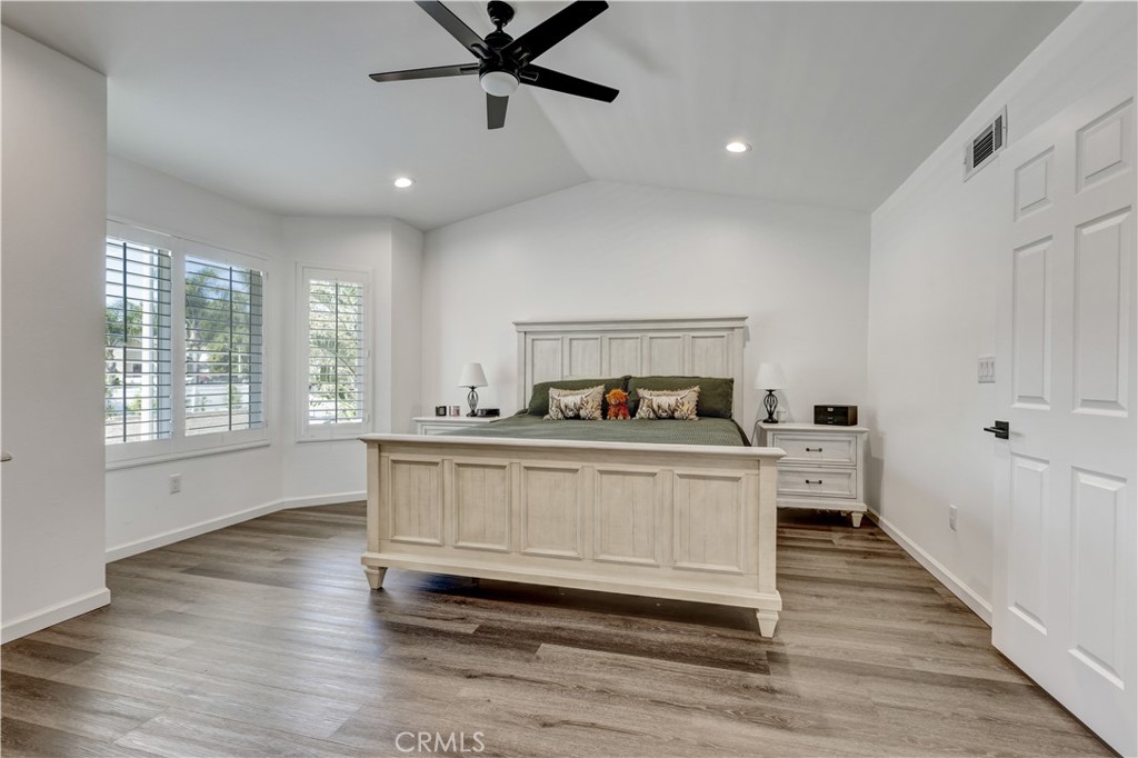 28102 Bobwhite Circle, Unit 3 Saugus, CA 91350 - Photo 30 of 50 a living room with a bed furniture and a window