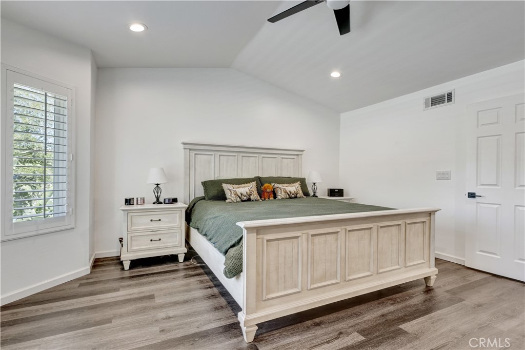 28102 Bobwhite Circle, Unit 3 Saugus, CA 91350 - Photo 31 of 50 a bedroom with a bed and a dresser