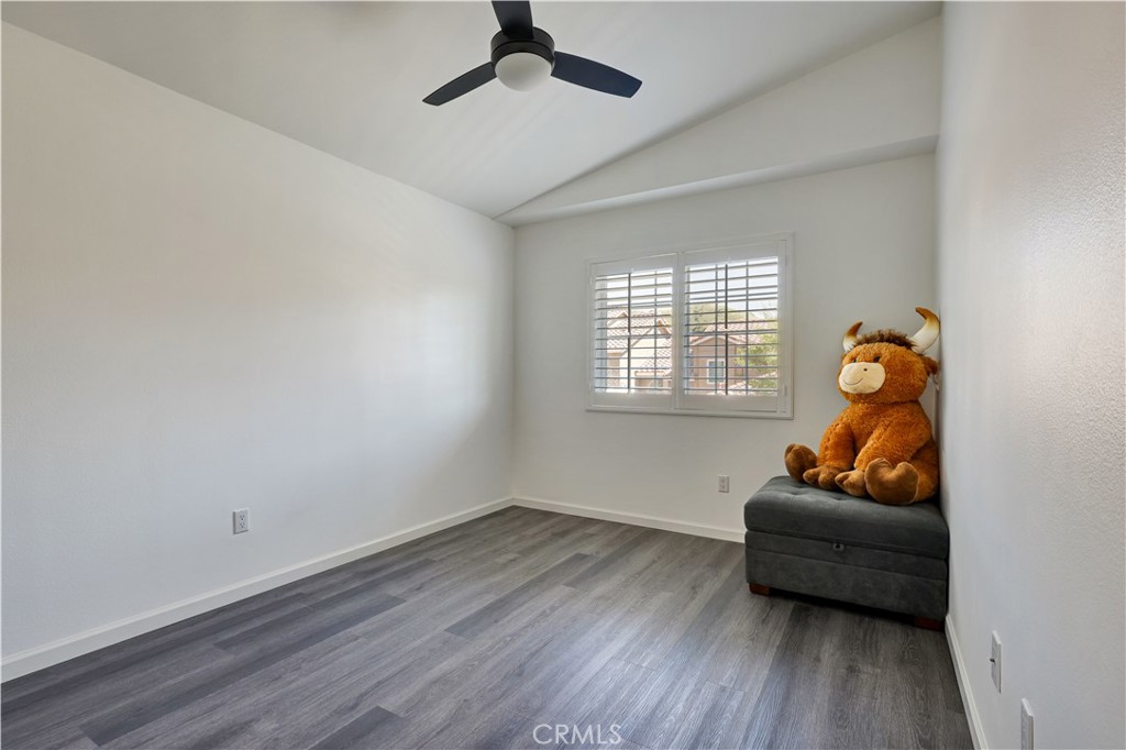 28102 Bobwhite Circle, Unit 3 Saugus, CA 91350 - Photo 34 of 50 a living room with furniture and a window