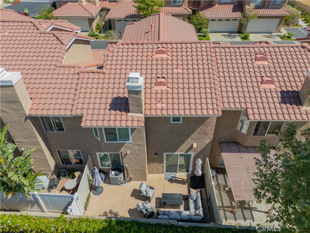 28102 Bobwhite Circle, Unit 3 Saugus, CA 91350 - Photo 47 of 50 an aerial view of residential houses with outdoor space