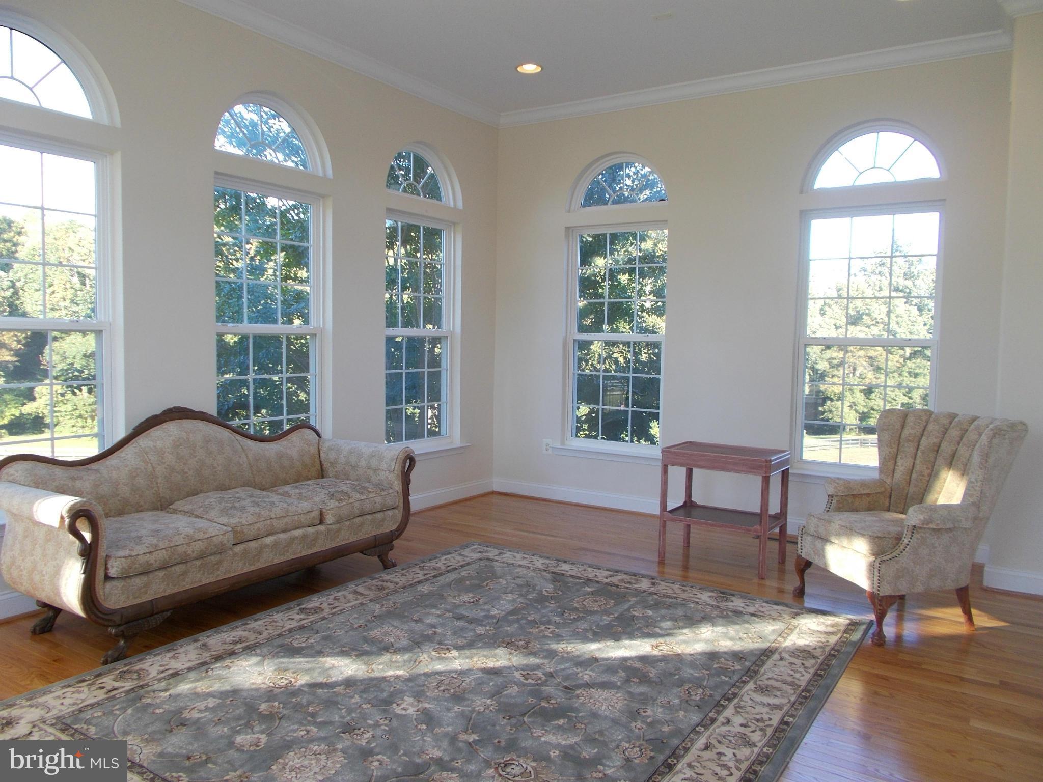 7475 Flint Hill Road Owings, MD 20736 - Photo 11 of 30 a living room with furniture and a large window