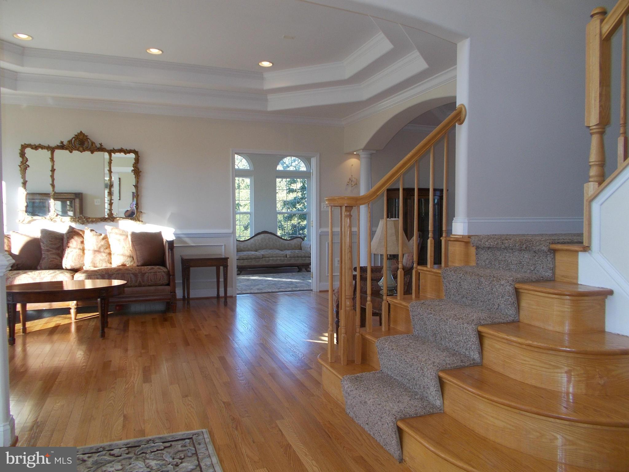 7475 Flint Hill Road Owings, MD 20736 - Photo 12 of 30 a living room with fireplace furniture and a wooden floor