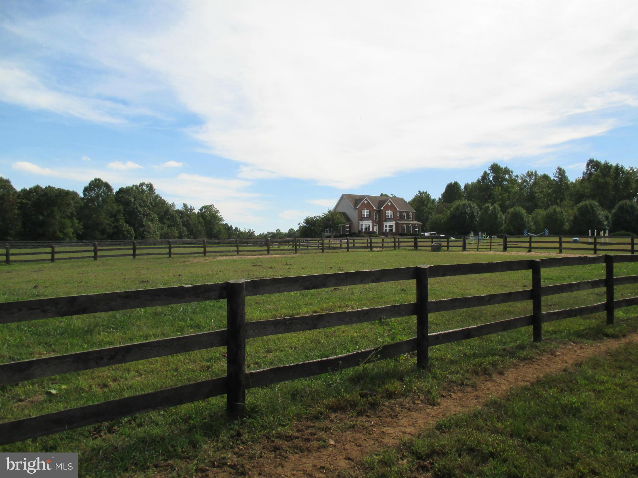 7475 Flint Hill Road Owings, MD 20736 - Photo 29 of 30 a view of park with bench and trees