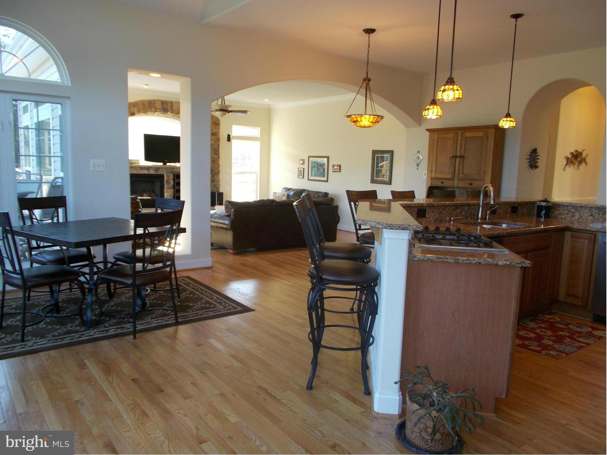 7475 Flint Hill Road Owings, MD 20736 - Photo 5 of 30 a view of a dining room with furniture window and wooden floor