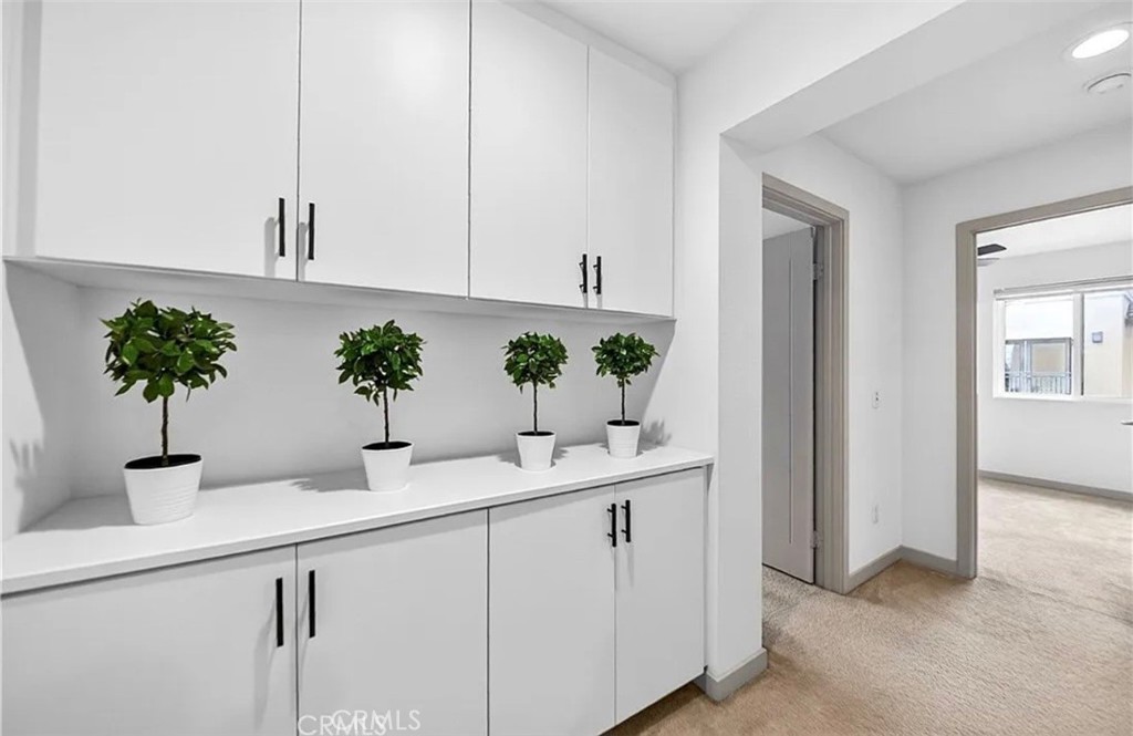 809 Anaheim Boulevard, Unit 106 Anaheim, CA 92805 - Photo 7 of 9 a bathroom with a sink and a mirror