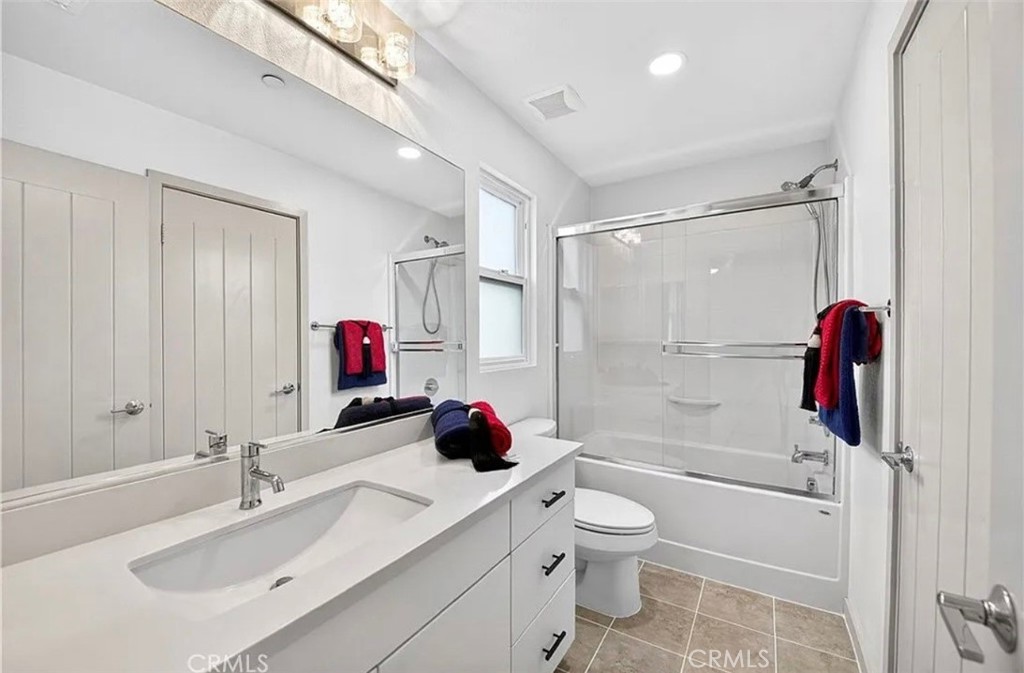809 Anaheim Boulevard, Unit 106 Anaheim, CA 92805 - Photo 9 of 9 a bathroom with a sink toilet tub and shower
