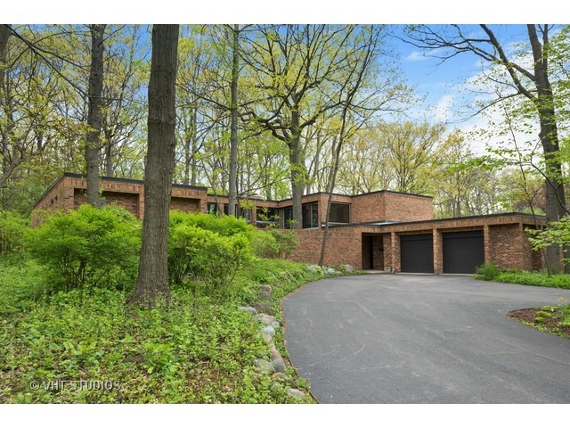 3290 Brook Road Highland Park, IL 60035 - Photo 1 of 19 a front view of a house with a yard