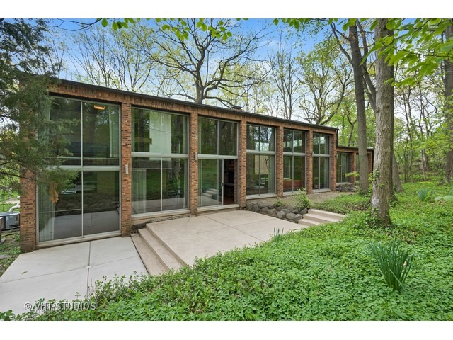 3290 Brook Road Highland Park, IL 60035 - Photo 16 of 19 a view of house with backyard space and garden