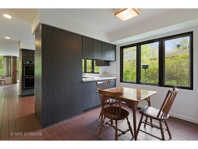 3290 Brook Road Highland Park, IL 60035 - Photo 7 of 19 a view of a dining room with furniture window and outside view