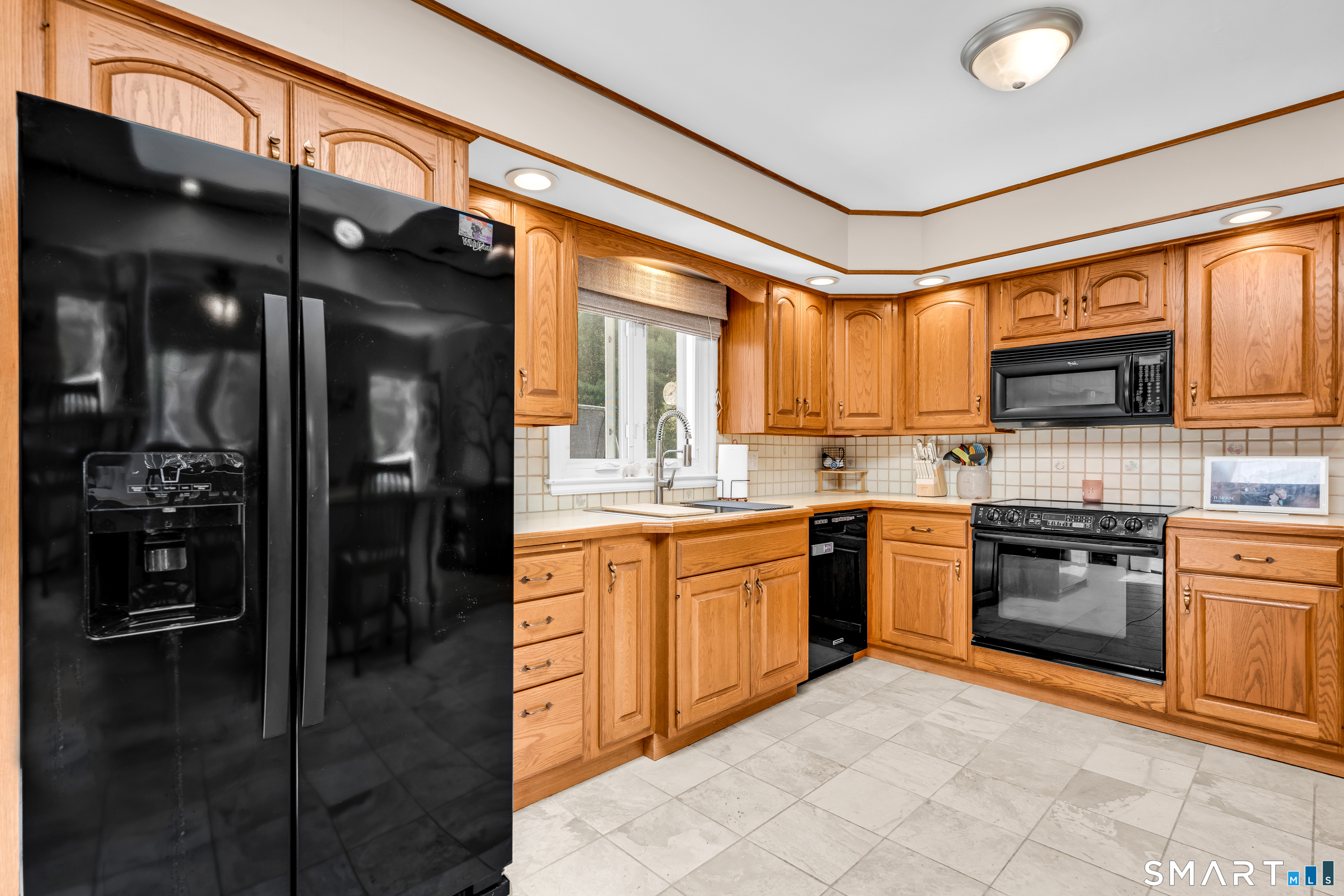 2 Hemlock Road Prospect, CT 06712 - Photo 8 of 27 a large kitchen with stainless steel appliances granite countertop a stove cabinets and a sink