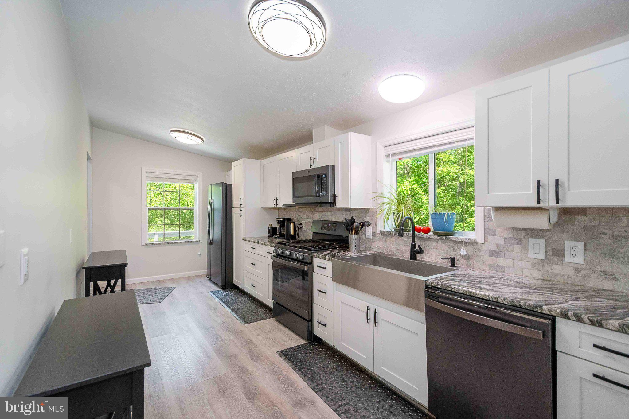 511 Hill Top Road Oakland, MD 21550 - Photo 18 of 51 Modern kitchen with natural light.