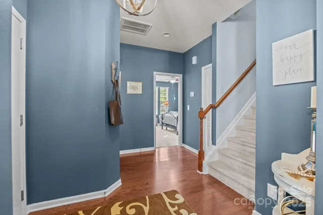 a view of entryway with wooden floor