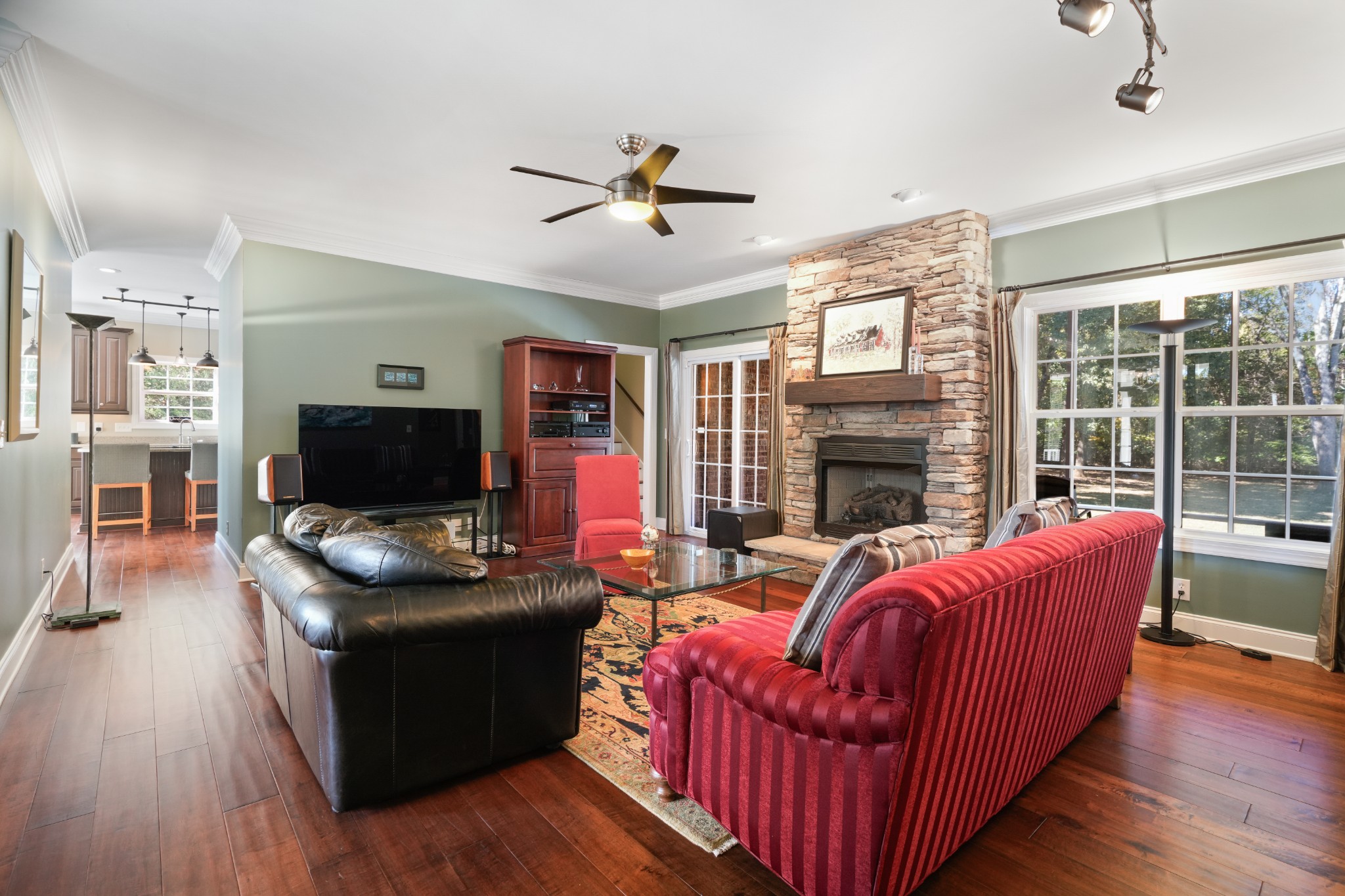 1124 Friendswood Lane Christiana, TN 37037 - Photo 12 of 34 a living room with furniture a flat screen tv and a fireplace