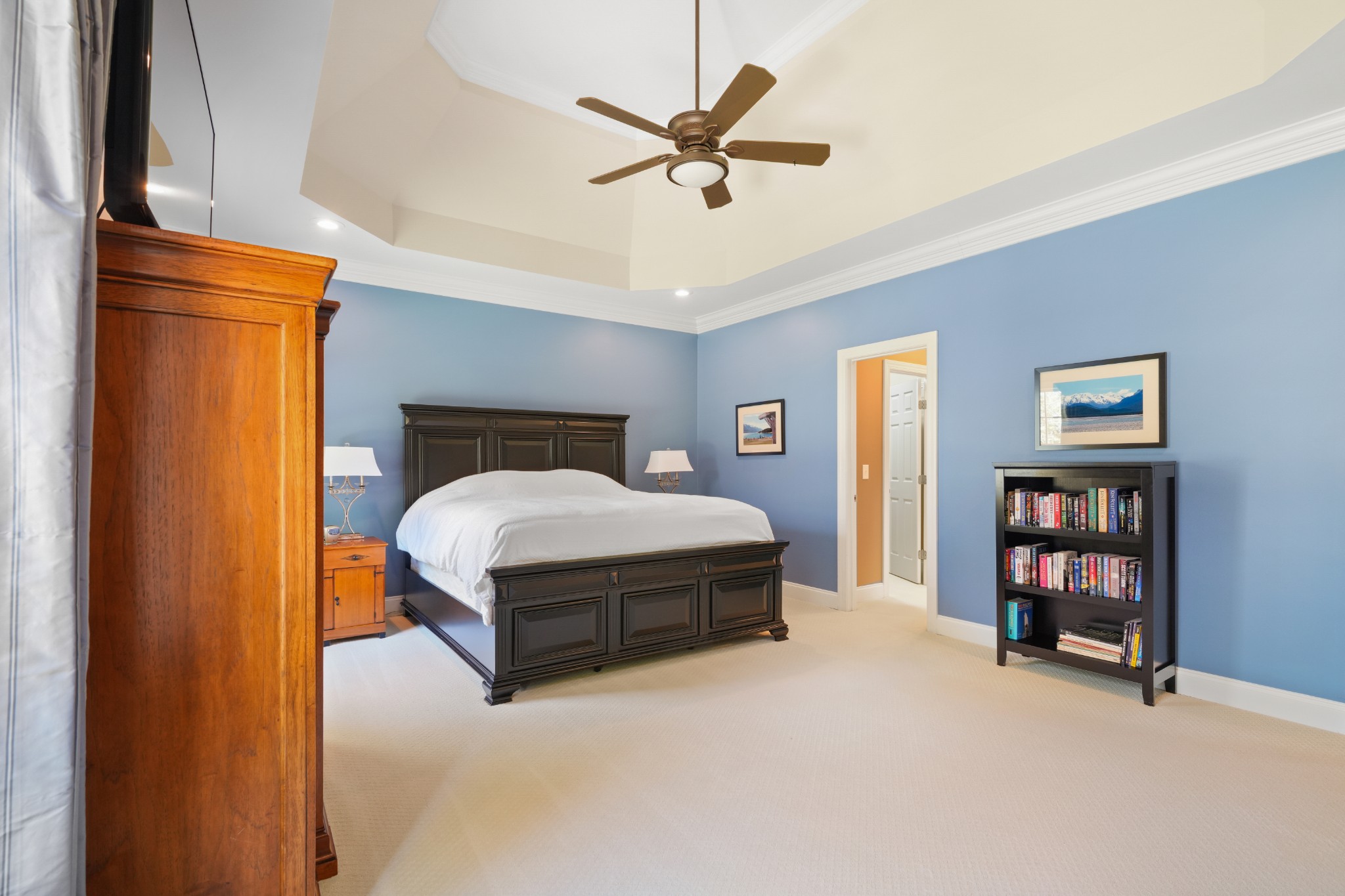 1124 Friendswood Lane Christiana, TN 37037 - Photo 20 of 34 a spacious bedroom with a bed and a ceiling fan