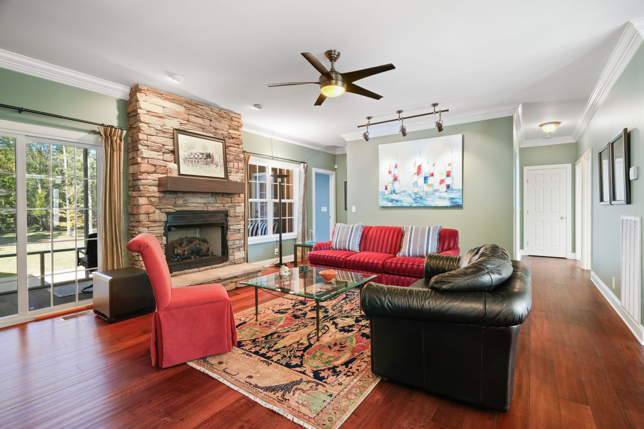 1124 Friendswood Lane Christiana, TN 37037 - Photo 10 of 34 a living room with furniture a flat screen tv and a fireplace