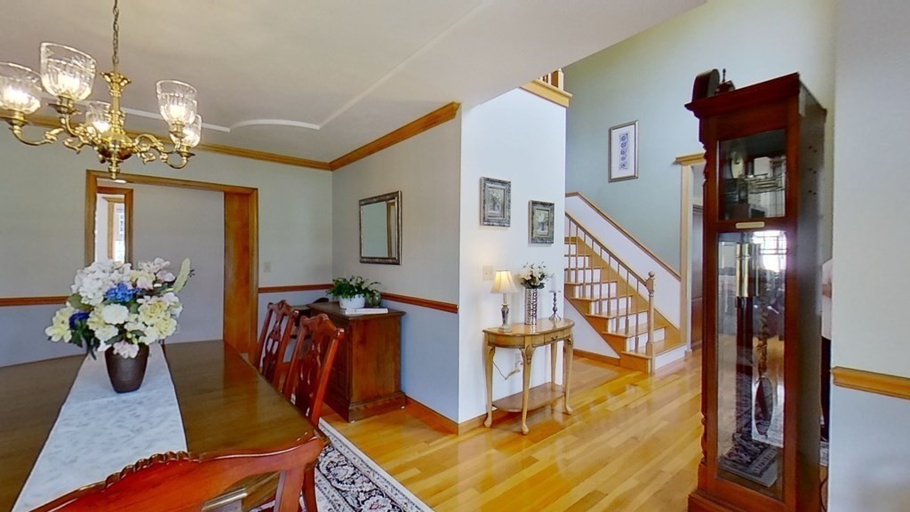 35 Brownfield Drive Bridgewater, MA 02324 - Photo 13 of 42 a living room with furniture chandelier and a chandelier