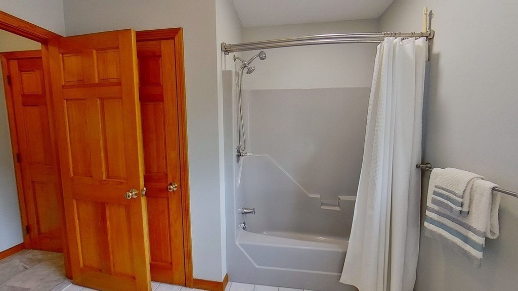 35 Brownfield Drive Bridgewater, MA 02324 - Photo 17 of 42 a bathroom with a shower and a tub