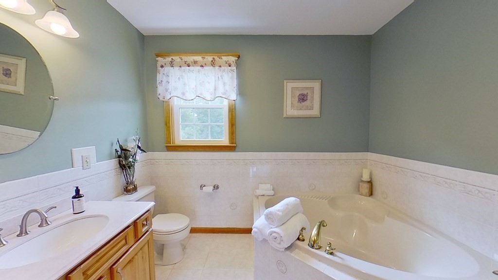 35 Brownfield Drive Bridgewater, MA 02324 - Photo 29 of 42 a bathroom with a sink a toilet and tub
