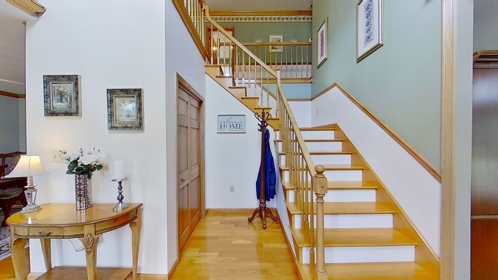 35 Brownfield Drive Bridgewater, MA 02324 - Photo 3 of 42 a view of entryway and hall with wooden floor