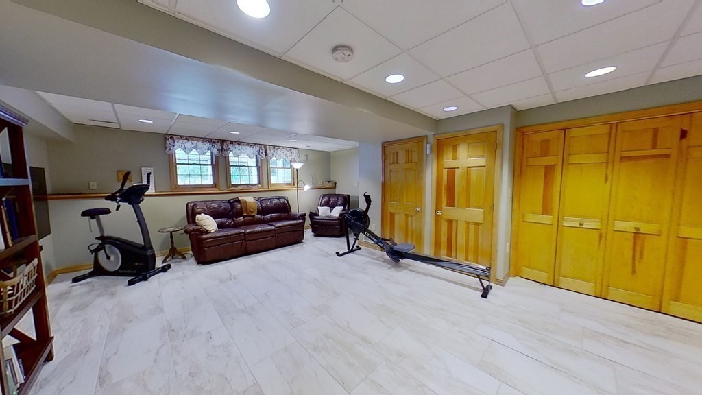 35 Brownfield Drive Bridgewater, MA 02324 - Photo 31 of 42 a large room with gym equipment and a large window