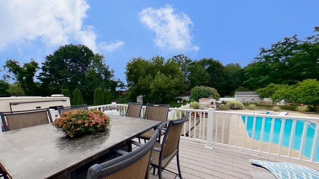 35 Brownfield Drive Bridgewater, MA 02324 - Photo 32 of 42 a view of a dinning table and chairs in the roof deck