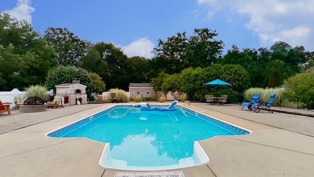 35 Brownfield Drive Bridgewater, MA 02324 - Photo 33 of 42 a view of a swimming pool with lounge chair