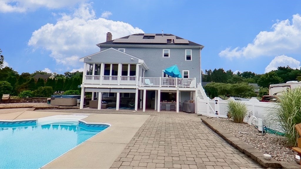 35 Brownfield Drive Bridgewater, MA 02324 - Photo 34 of 42 a front view of a house with a garden