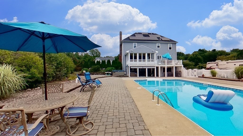 35 Brownfield Drive Bridgewater, MA 02324 - Photo 35 of 42 a view of a swimming pool with sitting area