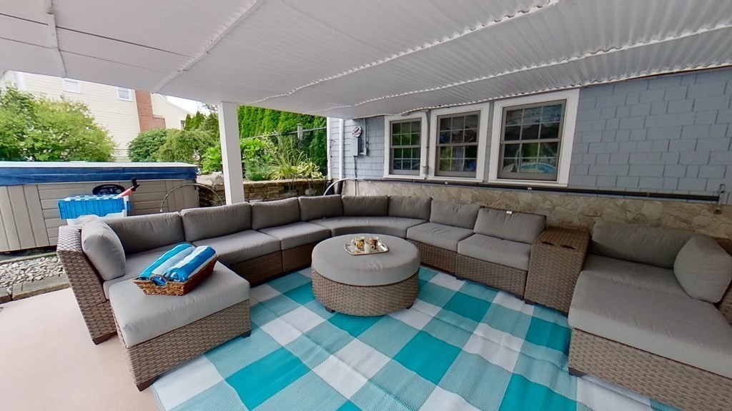 35 Brownfield Drive Bridgewater, MA 02324 - Photo 37 of 42 a living room with furniture and a large window