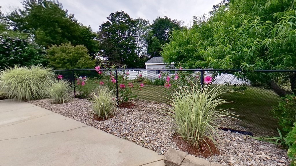 35 Brownfield Drive Bridgewater, MA 02324 - Photo 41 of 42 a view of a garden in front of a house