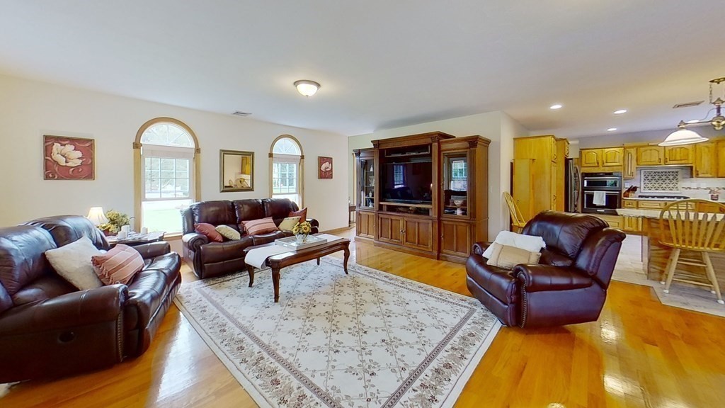 35 Brownfield Drive Bridgewater, MA 02324 - Photo 7 of 42 a living room with furniture rug and kitchen view