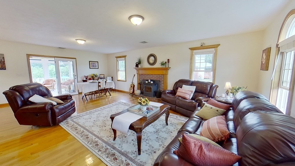 35 Brownfield Drive Bridgewater, MA 02324 - Photo 9 of 42 a living room with furniture fireplace and a window