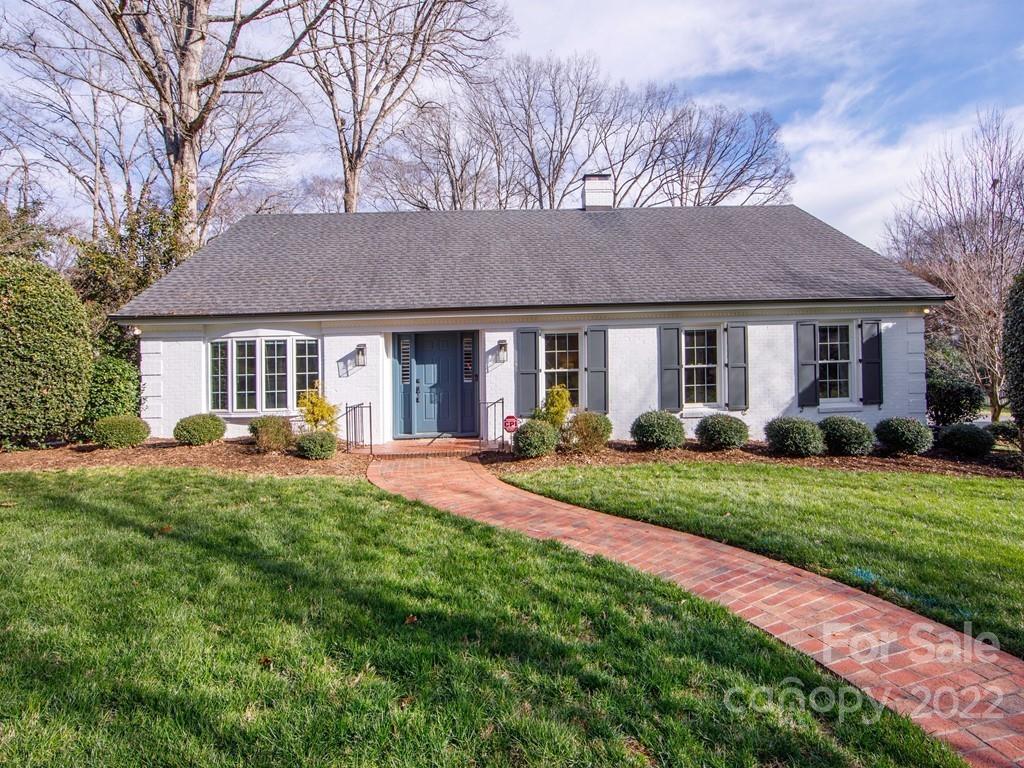 1000 Braeburn Road Charlotte, NC 28211 - Photo 1 of 48 a front view of a house with a yard and porch