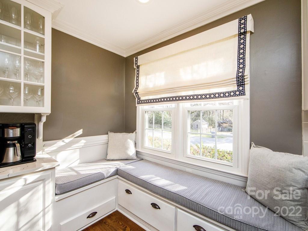 1000 Braeburn Road Charlotte, NC 28211 - Photo 17 of 48 a view of a kitchen with granite countertop cabinets and window