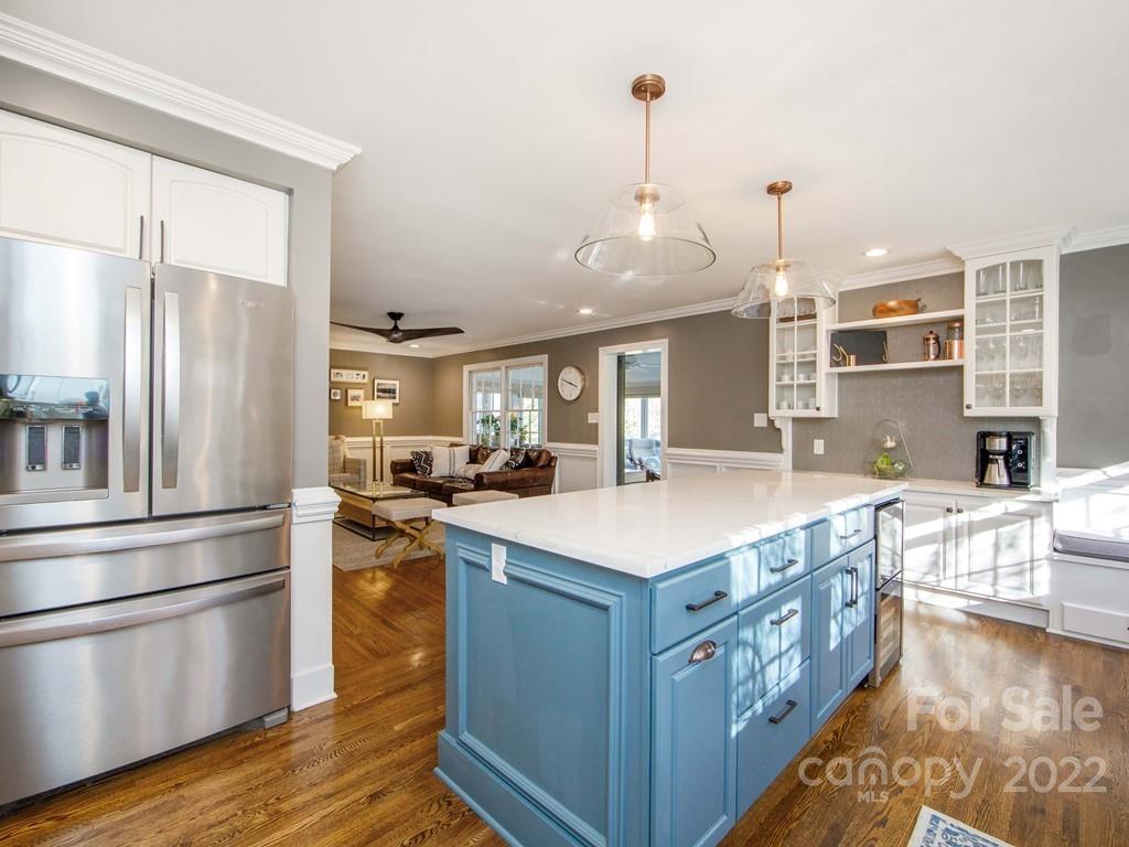1000 Braeburn Road Charlotte, NC 28211 - Photo 20 of 48 a kitchen with kitchen island a sink appliances and cabinets