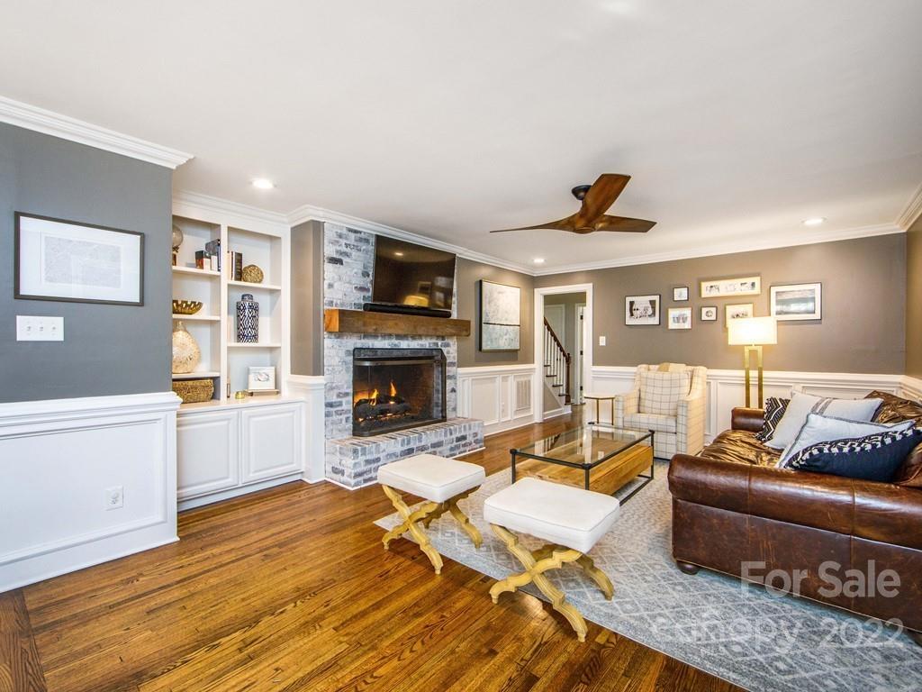 1000 Braeburn Road Charlotte, NC 28211 - Photo 22 of 48 a living room with furniture and a fireplace