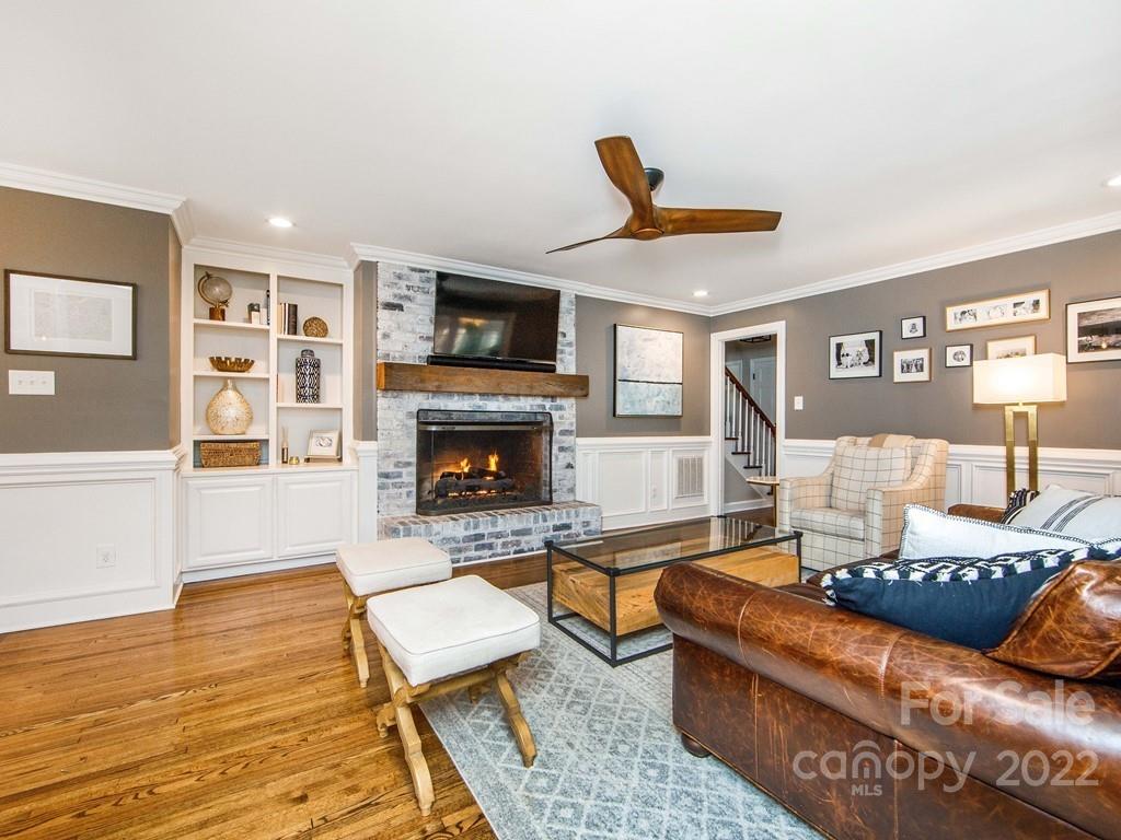 1000 Braeburn Road Charlotte, NC 28211 - Photo 23 of 48 a living room with furniture and a fireplace