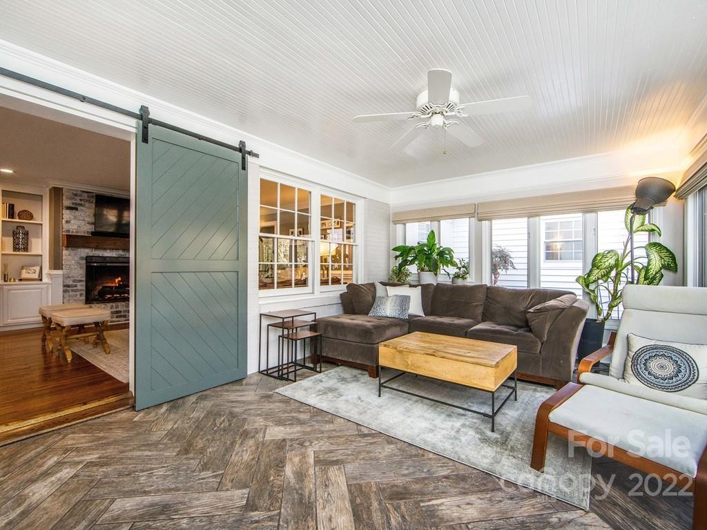 1000 Braeburn Road Charlotte, NC 28211 - Photo 26 of 48 a living room with furniture and a window