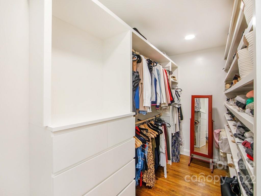 1000 Braeburn Road Charlotte, NC 28211 - Photo 33 of 48 a view of walk in closet with clothes