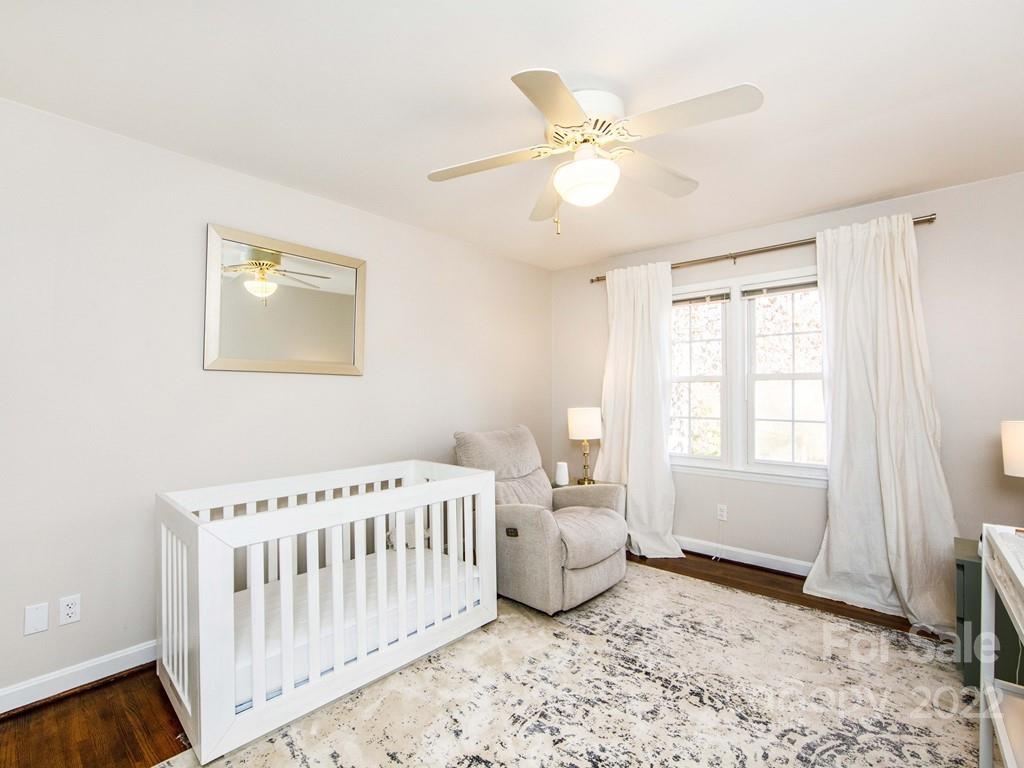 1000 Braeburn Road Charlotte, NC 28211 - Photo 39 of 48 a bedroom with a bed and window