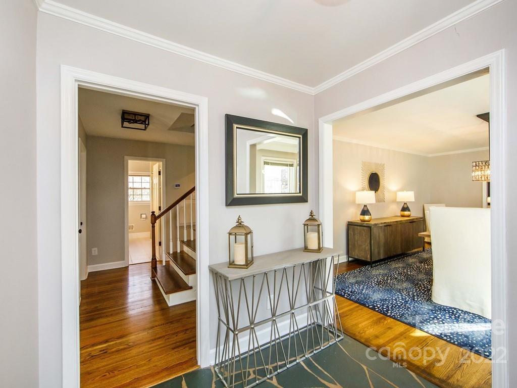 1000 Braeburn Road Charlotte, NC 28211 - Photo 6 of 48 a living room with furniture and a wooden floor