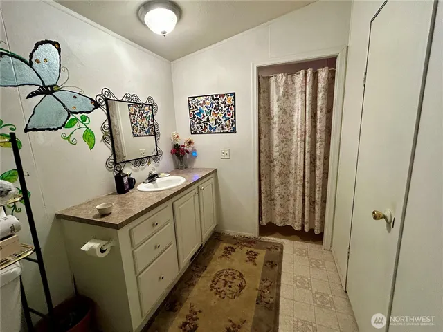 a kitchen with sink cabinets and outdoor view