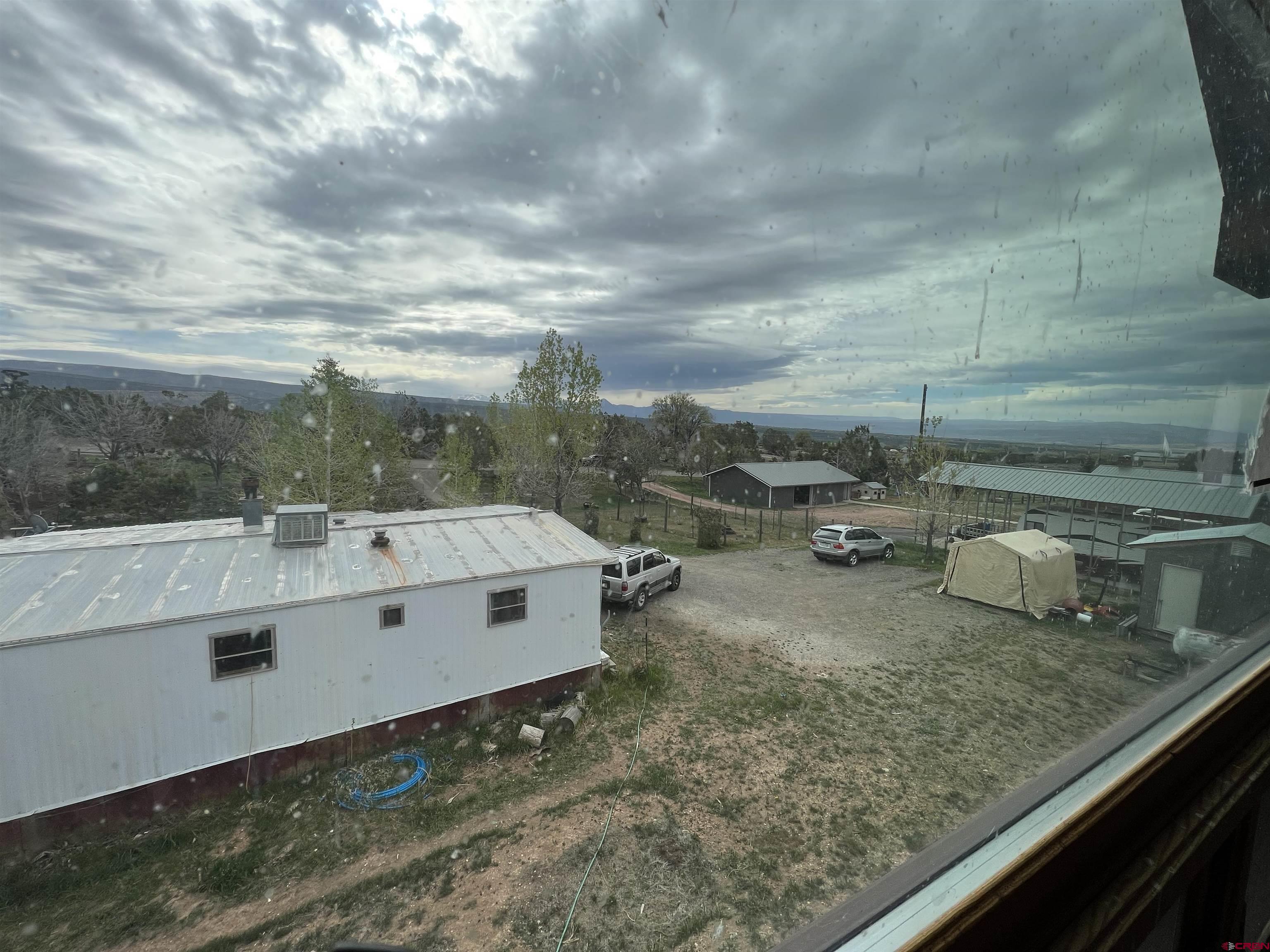 17081 2550th Road Cedaredge, CO 81413 - Photo 13 of 21 a view of a terrace with a sink
